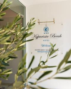 a sign for the rutherford branch hotel at Kyparissia Beach Hotel in Kyparissia