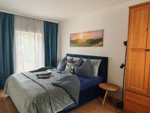 Ένα ή περισσότερα κρεβάτια σε δωμάτιο στο Apartmán 4, Pstruží, Krušné hory +19 φωτογραφίες