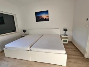 Ένα ή περισσότερα κρεβάτια σε δωμάτιο στο Villa Lina Sea Breeze +14 φωτογραφίες