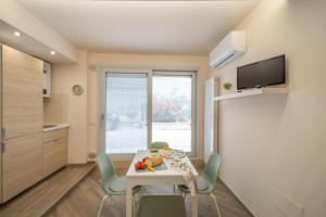 Μια τηλεόραση ή/και κέντρο ψυχαγωγίας στο Cozy Flat - nel Cuore di Santa Maria - ItalyWeGo