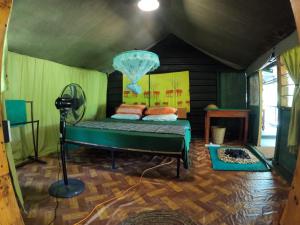 Postel nebo postele na pokoji v ubytování Jungle Cabin - Bundala