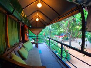 Postel nebo postele na pokoji v ubytování Jungle Cabin - Bundala