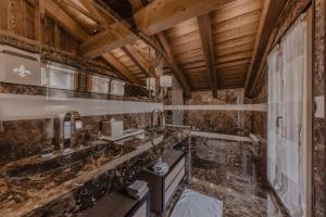 Eldhús eða eldhúskrókur á Ultima Hotel Gstaad