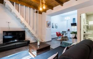 TV a/nebo společenská místnost v ubytování Duplex Los Corceles Casa Palacio