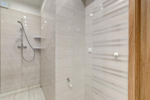 Koupelna v ubytování Apartament Brzeźno