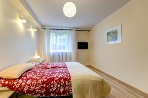Postel nebo postele na pokoji v ubytování Apartament Brzeźno