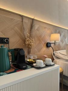 Ένα ή περισσότερα κρεβάτια σε δωμάτιο στο B&B Les Capitaineries