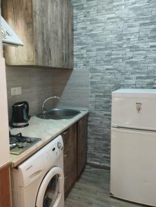 Η κουζίνα ή μικρή κουζίνα στο Hotel cozy tbilisi Georgia