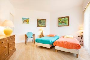 Postel nebo postele na pokoji v ubytování Magnifique villa accès direct plage