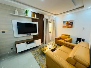 TV a/nebo společenská místnost v ubytování Le Corossolier 404 - Studio chic 4e étage aux Maristes