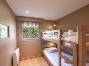 Posteľ alebo postele v izbe v ubytovaní Appartement chic avec sauna et parking au centre de Chamonix - FR-1-343-190