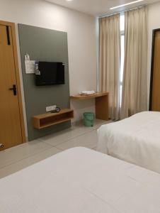 TV a/nebo společenská místnost v ubytování Hotel Vrajleela