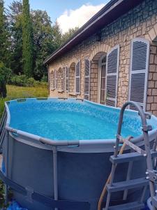 Swimmingpoolen hos eller tæt på La maison du pianiste