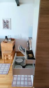 a kitchen with a stove top oven in a room at Apartma Lina in Bovec