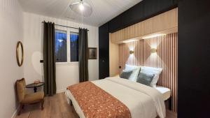 Postel nebo postele na pokoji v ubytování Maison Climatisée 5min Cité Terrasse et Parking AK