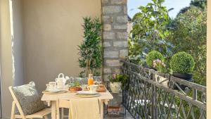 Balkón nebo terasa v ubytování Maison Climatisée 5min Cité Terrasse et Parking AK