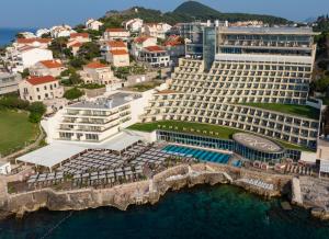 an aerial view of a hotel and the ocean at Rixos Premium Dubrovnik in Dubrovnik