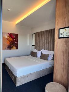 Postel nebo postele na pokoji v ubytování Hotel Delta Premium