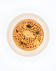 a bowl of noodles on a white plate at Hotel Atlantic Hamburg, Autograph Collection in Hamburg
