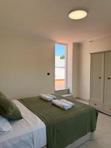 Postel nebo postele na pokoji v ubytování A&N Velez Malaga Soho Boutique