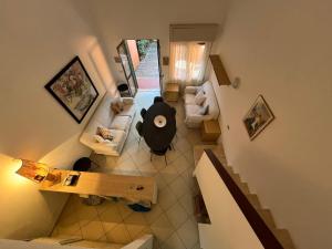 an overhead view of a living room with a couch at Serra Degli Alimini 2 in Alimini