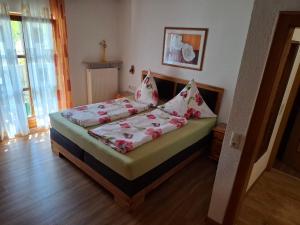 Postel nebo postele na pokoji v ubytování Ferienwohnung 2