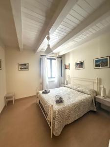Postel nebo postele na pokoji v ubytování B&B Certe Notti
