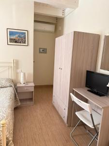TV a/nebo společenská místnost v ubytování B&B Certe Notti