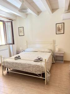 Postel nebo postele na pokoji v ubytování B&B Certe Notti