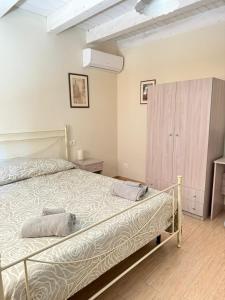Postel nebo postele na pokoji v ubytování B&B Certe Notti