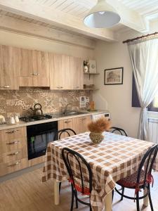 Kuchyň nebo kuchyňský kout v ubytování B&B Certe Notti