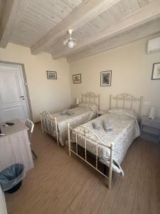 Postel nebo postele na pokoji v ubytování B&B Certe Notti