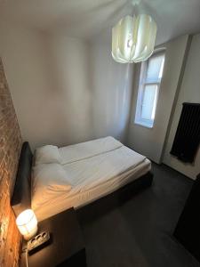 Posteľ alebo postele v izbe v ubytovaní City center apartment-Wrocławska