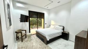 Ένα ή περισσότερα κρεβάτια σε δωμάτιο στο Villa house 24 +23 φωτογραφίες