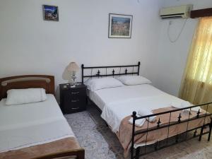 Postel nebo postele na pokoji v ubytování Guesthouse Reçka