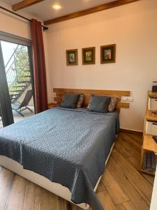 Postel nebo postele na pokoji v ubytování Agora Sundeck Tsikhisdziri