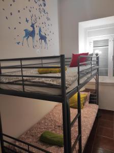 a bunk bed room with two bunk beds in a room at Perfect Room Near Airport 2 in Lisbon