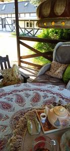 a table with a tray of food on it at Pokoje gościnne Stajnia Dorado-Agroturystyka in Leoncin +25 photos