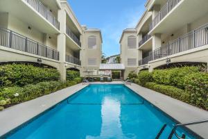 a swimming pool in the middle of a building at Salty Breeze in Saint Simons Island