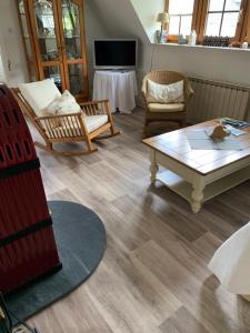 Posezení v ubytování Ferienwohnung Hügel