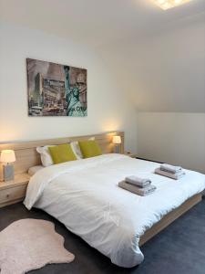 Postel nebo postele na pokoji v ubytování Loft de prestige au pied du circuit