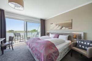 Galería fotográfica de Strand No 1 Hotel Strand No 1 - Doppelzimmer 2 - Meerblick en Sankt Peter-Ording