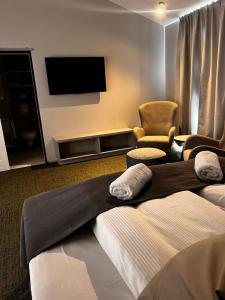 TV a/nebo společenská místnost v ubytování Hótel Skógafoss by EJ Hotels