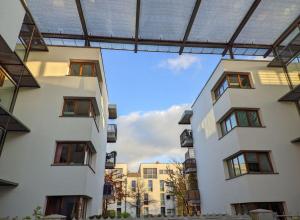 a view of a building with a solar roof at Luxus Apartment Hannover in Hannover