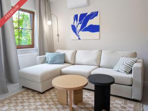 a living room with a couch and a table at Nautilus-Rowy in Rowy +39 photos