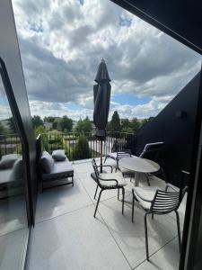 Balkón nebo terasa v ubytování Business Accommodation 'Loft' Intimate