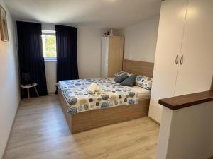 Postel nebo postele na pokoji v ubytování Apartment Barbara