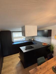 Kuchyň nebo kuchyňský kout v ubytování Apartment Barbara