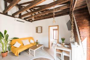 a living room with a couch and a table at Cottage & Vintage in Madrid