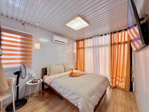 Postel nebo postele na pokoji v ubytování Sunset Hill Cabins